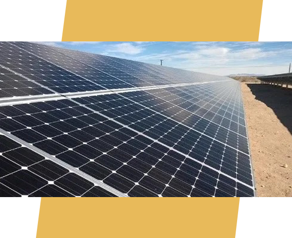 A large solar panel sitting on top of a field.