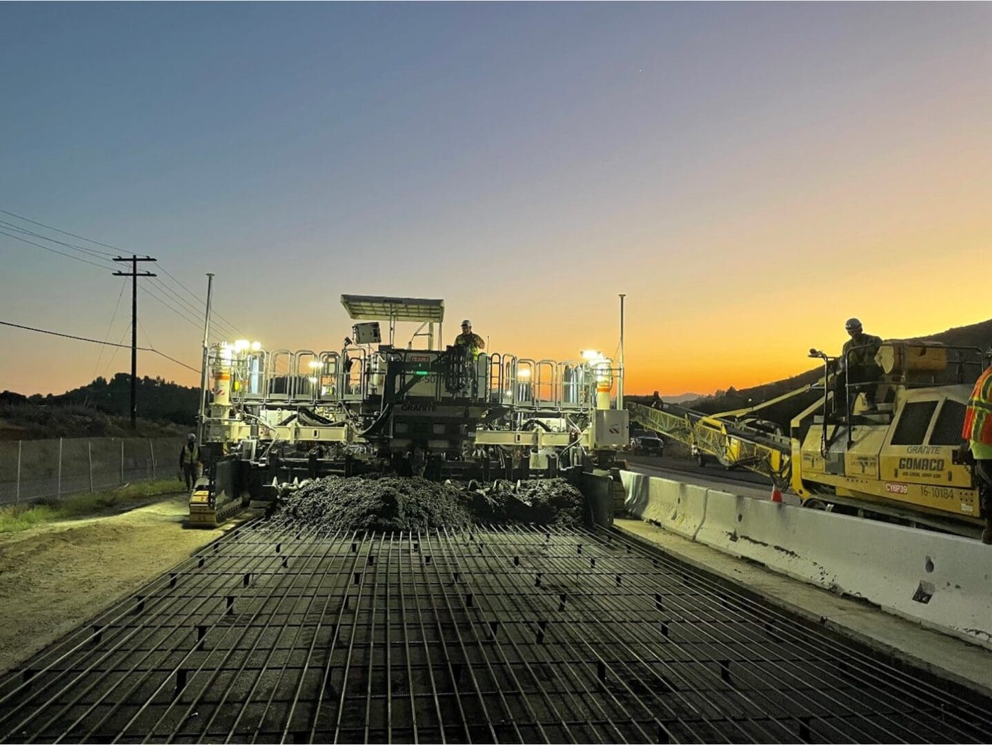 A large concrete machine is in the middle of construction.